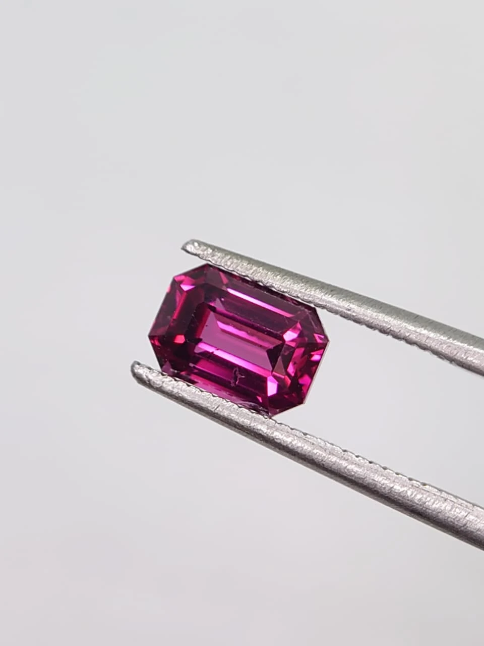 1.8ct Natural Emerald Cut Faceted Malaya Garnet from Tanzania — view 2